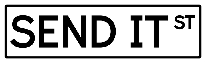 Send It St street sign white with black lettering