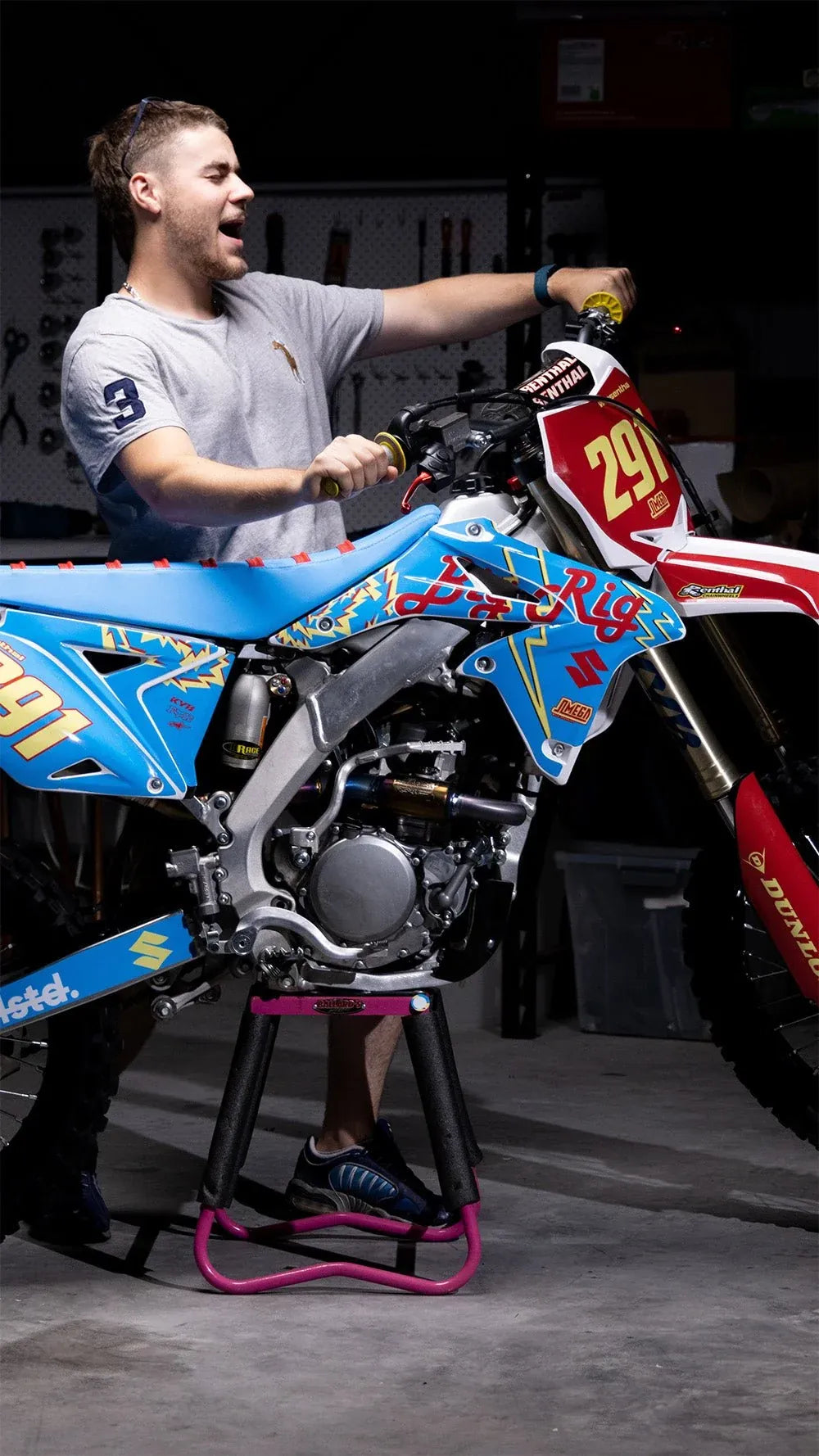 Isaac W. with his custom Omega Moto Graphics bike